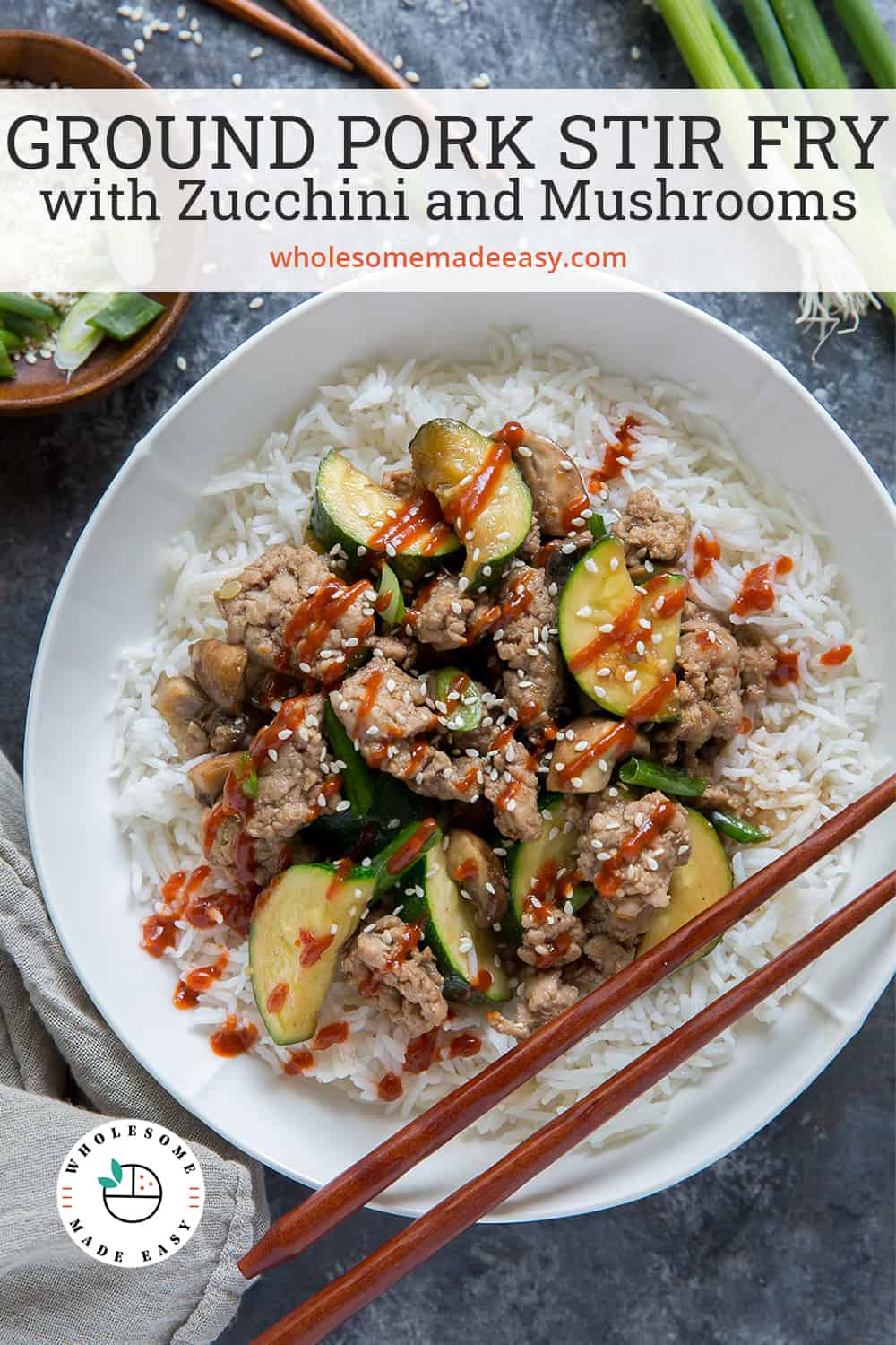 Ground Pork Stir Fry over rice in a white bowl with chopsticks with text overlay.