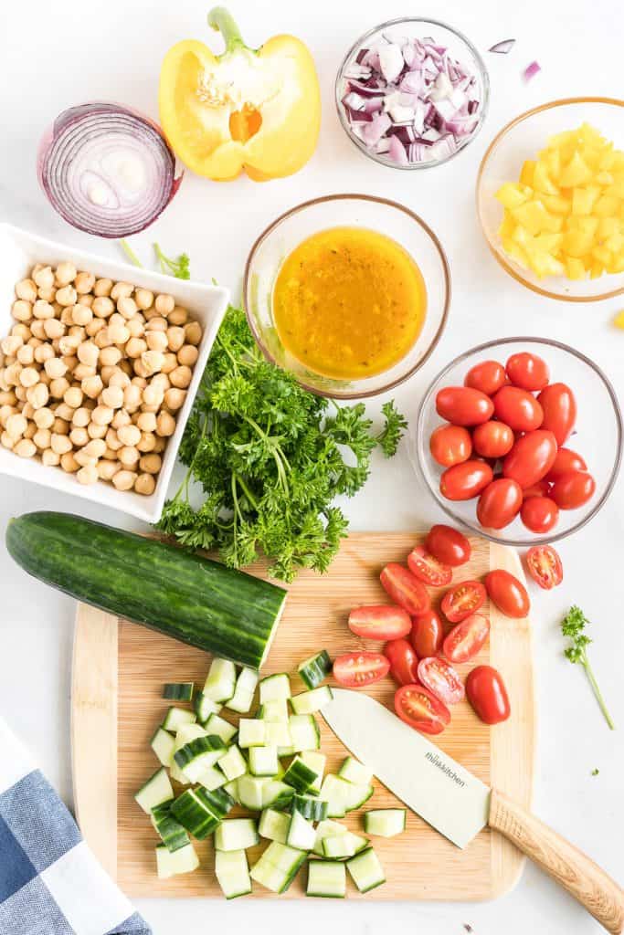 All the ingredients required to make Chickpea Salad.