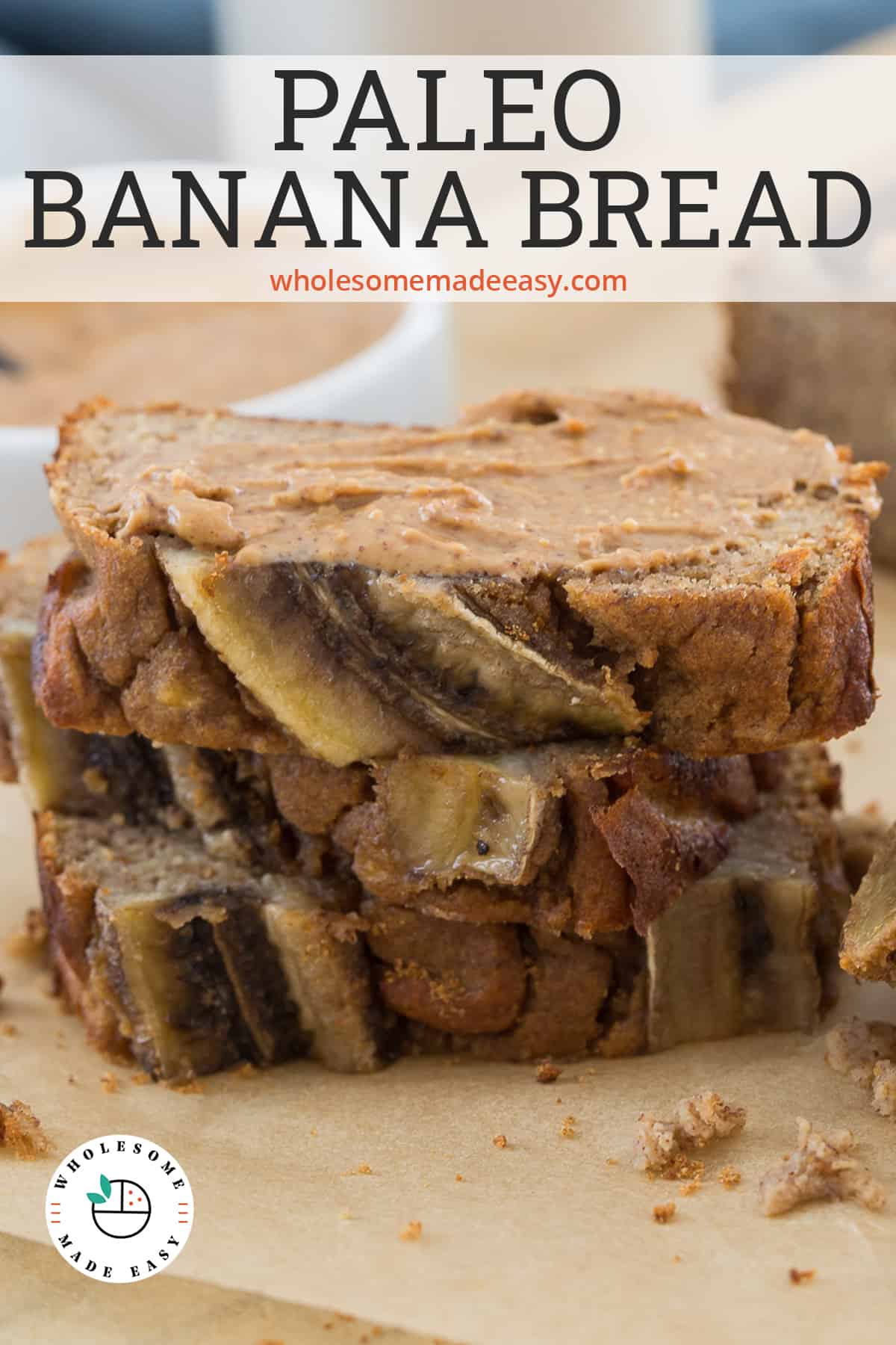 Three slices of Paleo Banana Bread stacked on parchment paper with text overlay.