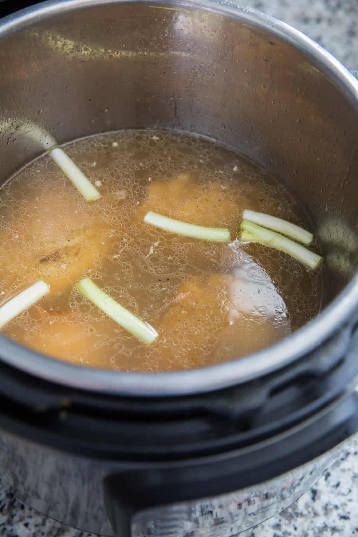 chicken thighs with broth in an instant pot
