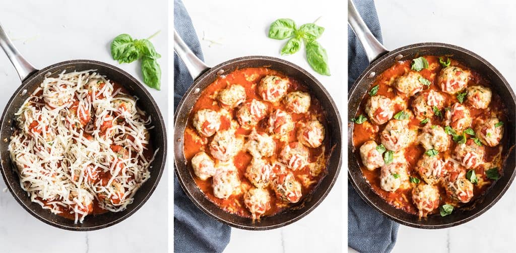 Meatballs topped with shredded cheese and marinara sauce in a skillet.