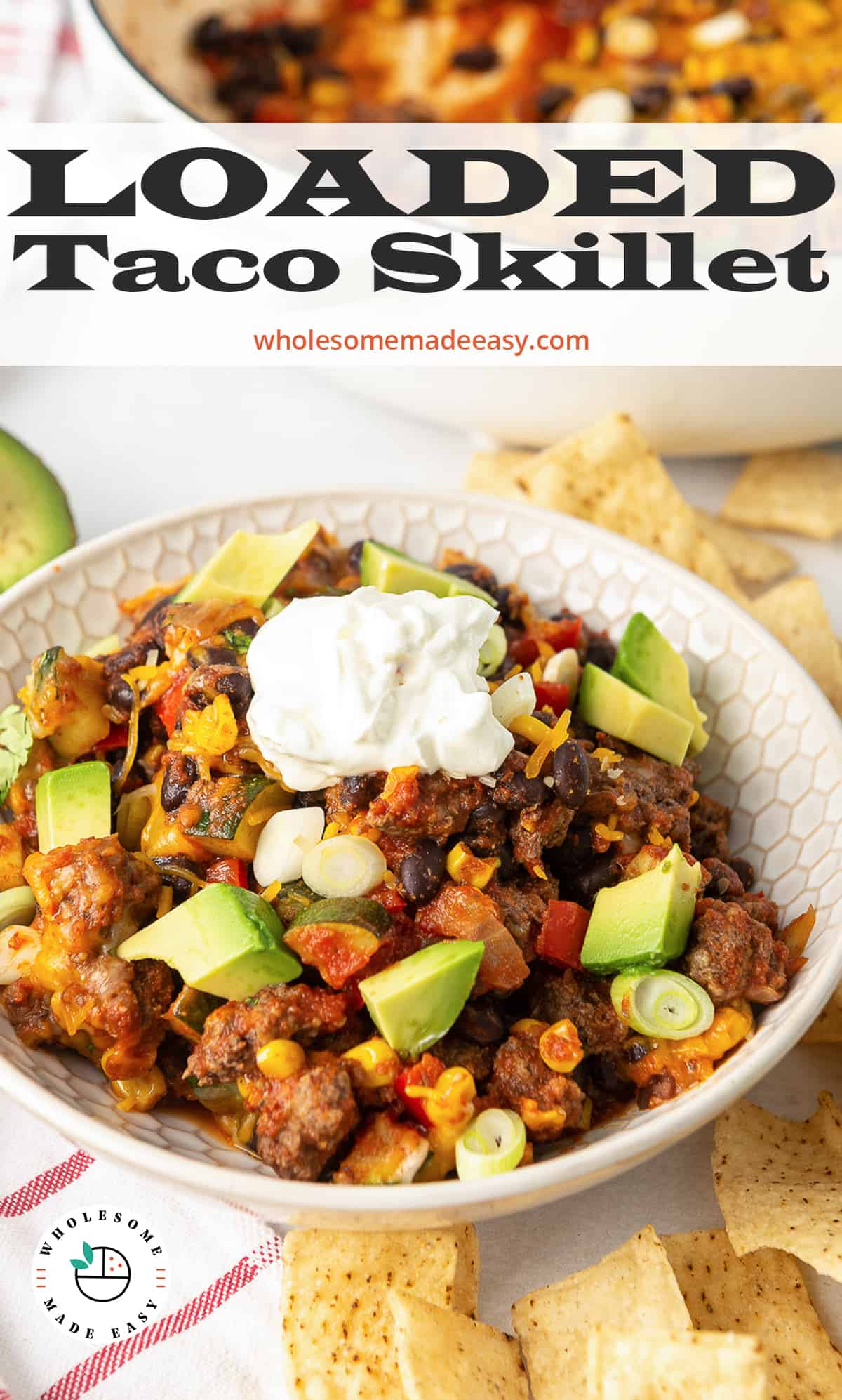 A white bowl filled with Loaded Taco Skillet with text overlay.