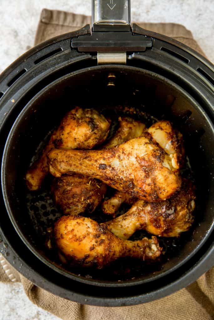 Cooked chicken drumsticks in an air fryer