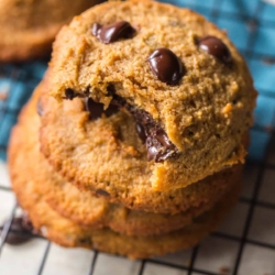 stack of paleo chocolate chip cookies with a bite taken