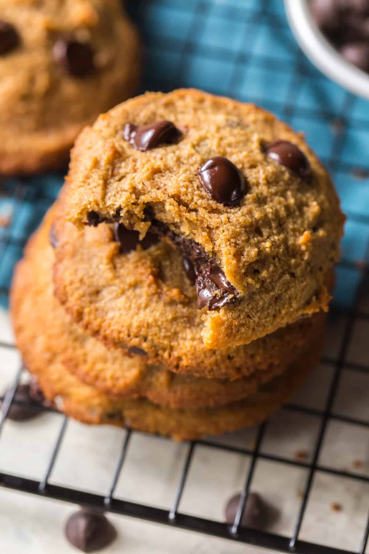 stack of paleo chocolate chip cookies with a bite taken