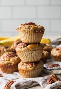 A stack of three Banana Pecan Protein Muffins.