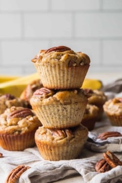 A stack of three Banana Pecan Protein Muffins.