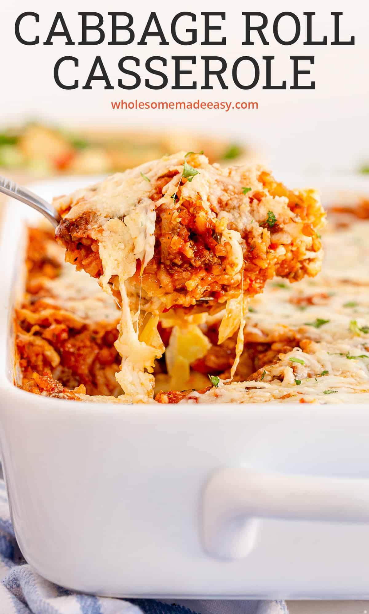 A spoon scoops up Cabbage Roll Casserole from a baking dish with text overlay.