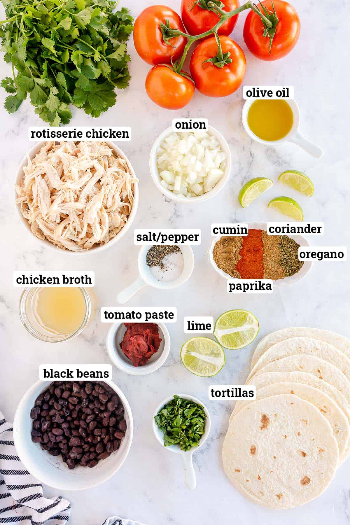 The ingredients to make Rotisserie Chicken Tacos with overlay text.
