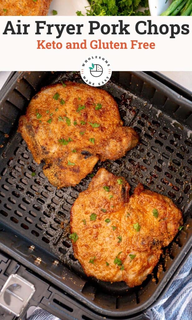 Two cooked pork chops in an air fryer with overlay text.