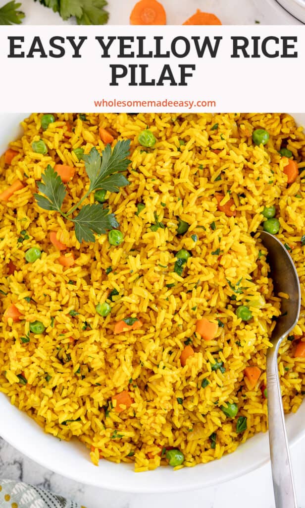 Yellow Rice Pilaf in a white bowl with a spoon with text.
