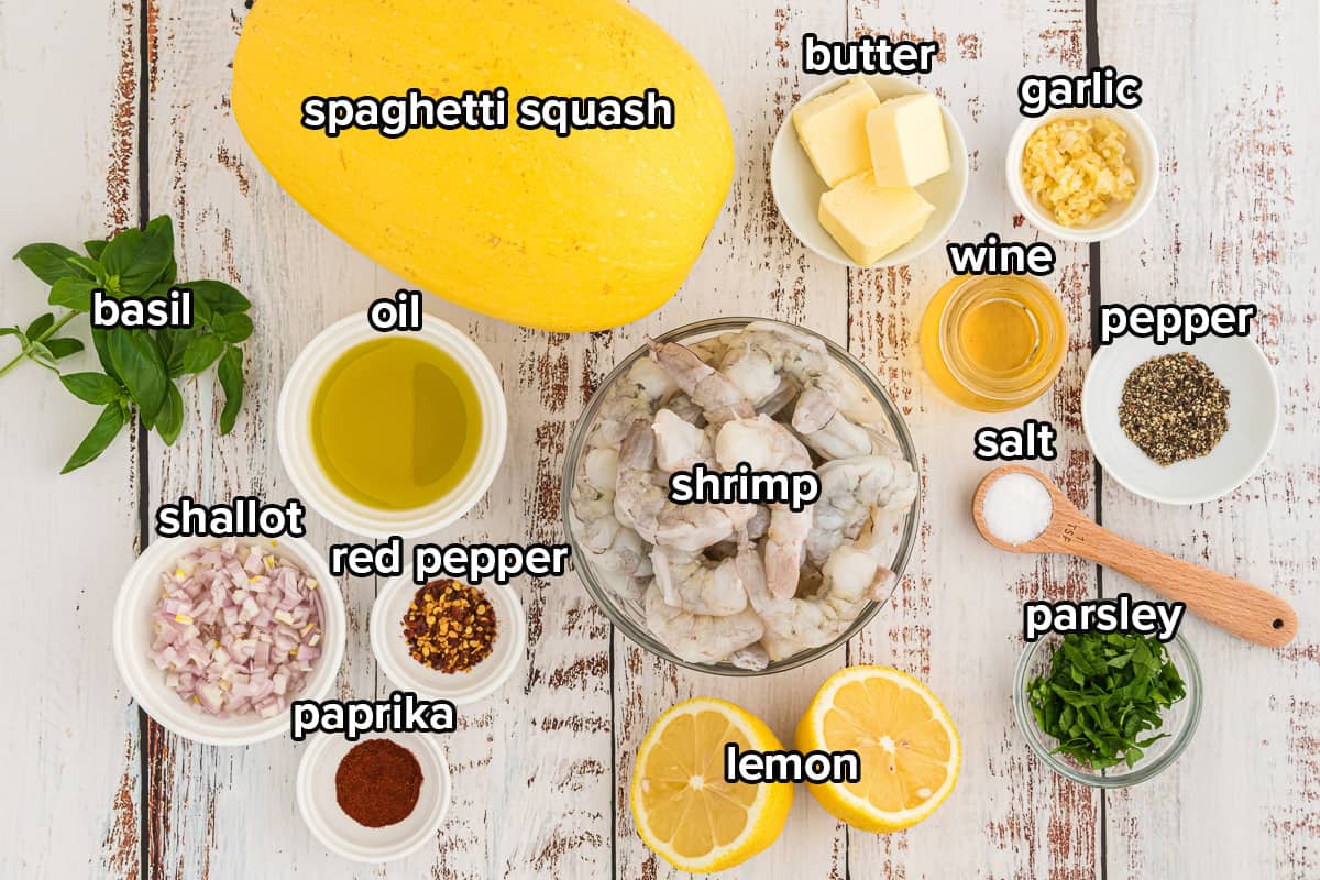 The ingredients for spaghetti squash shrimp scampi on a white board with text.