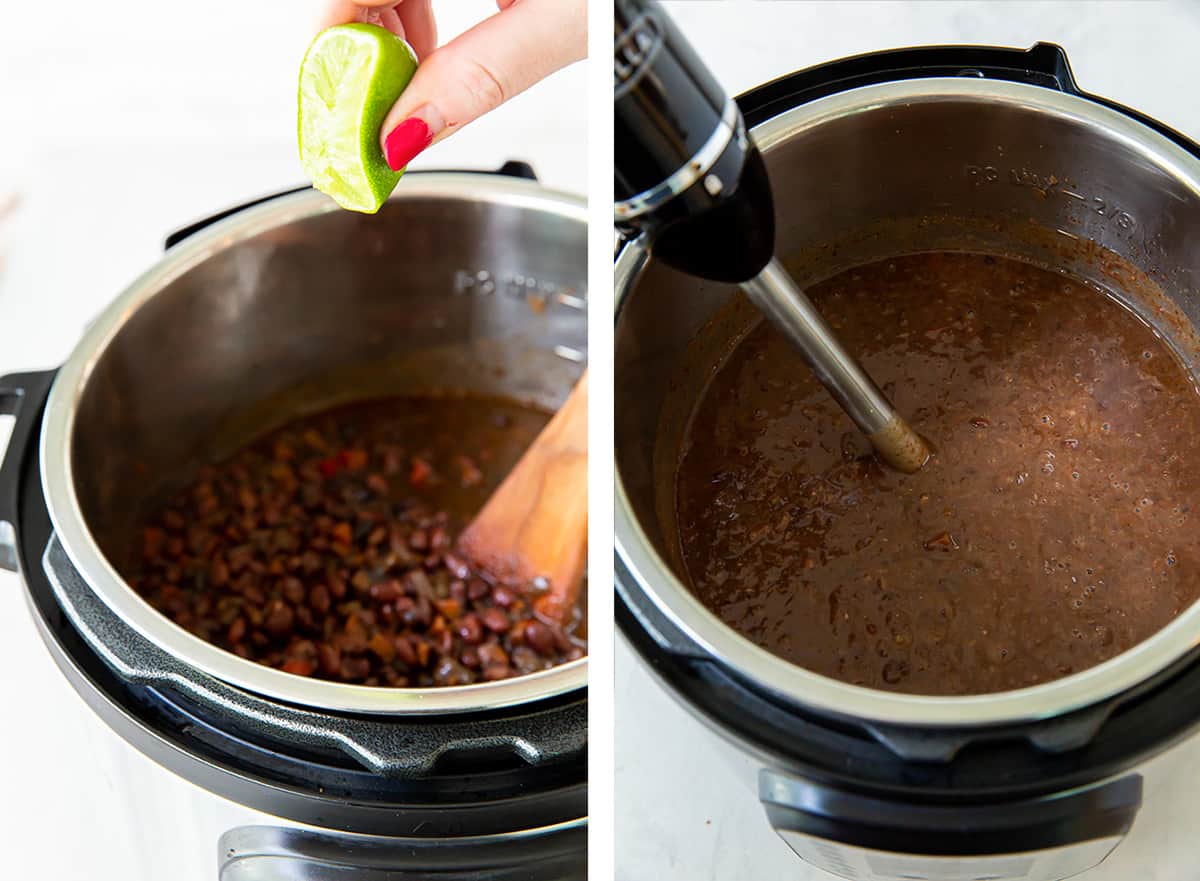A hand squeezing half a lime over an Instant Pot full of black bean soup and an immersion blender resting in the soup.