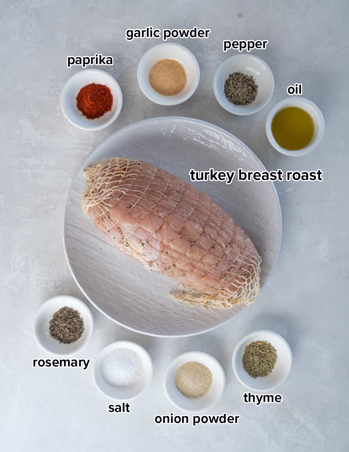 A Butterball boneless turkey breast roast surrounded by small bowls filled with seasonings and oil with text.