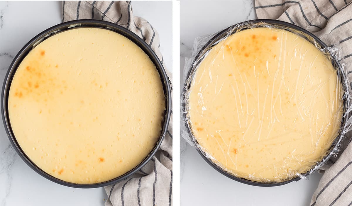 A cheesecake in a spring form pan and then a layer of plastic wrap pressed over the filling.