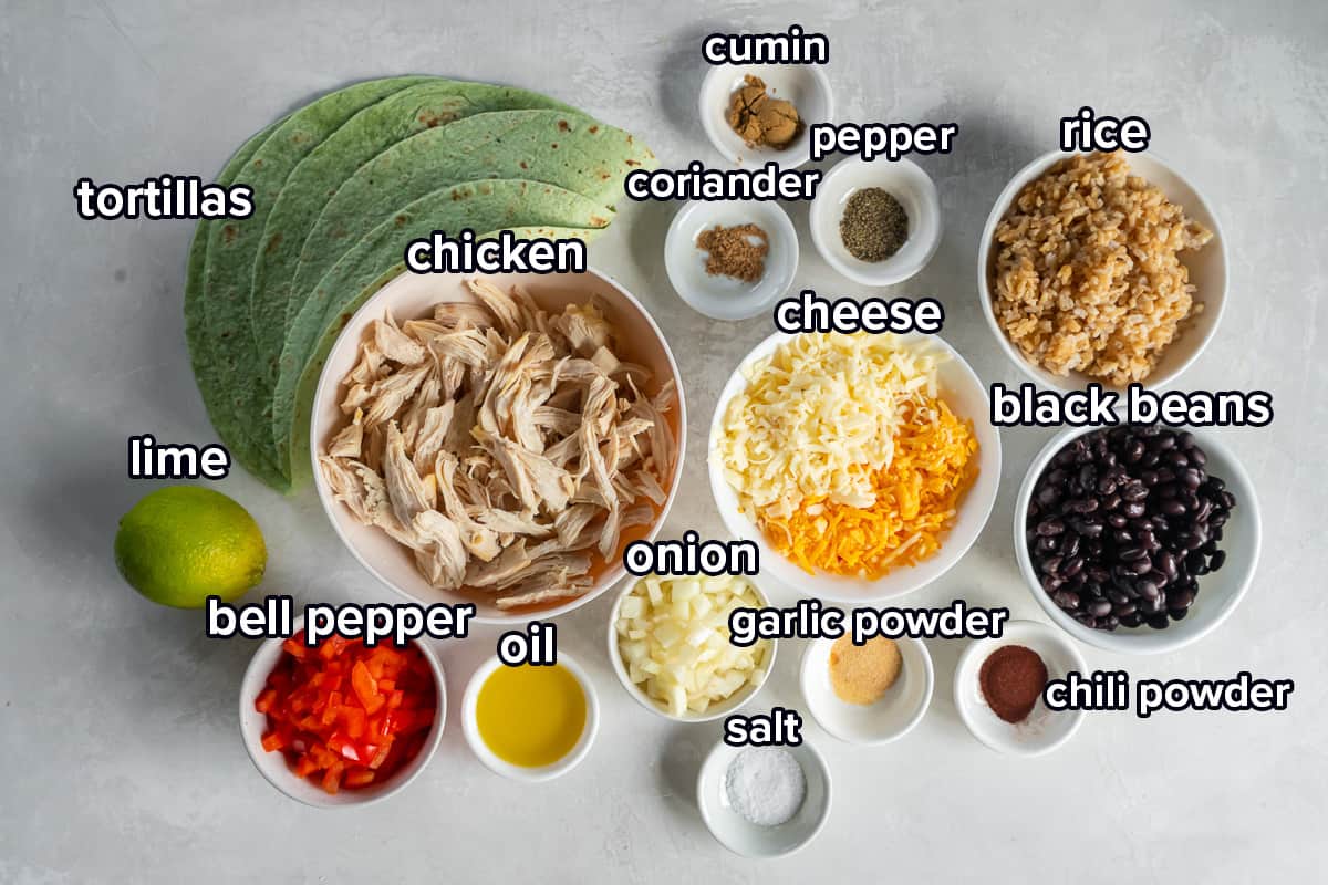 Spinach tortillas, chicken, beans, rice, and seasonings in bowls with text.