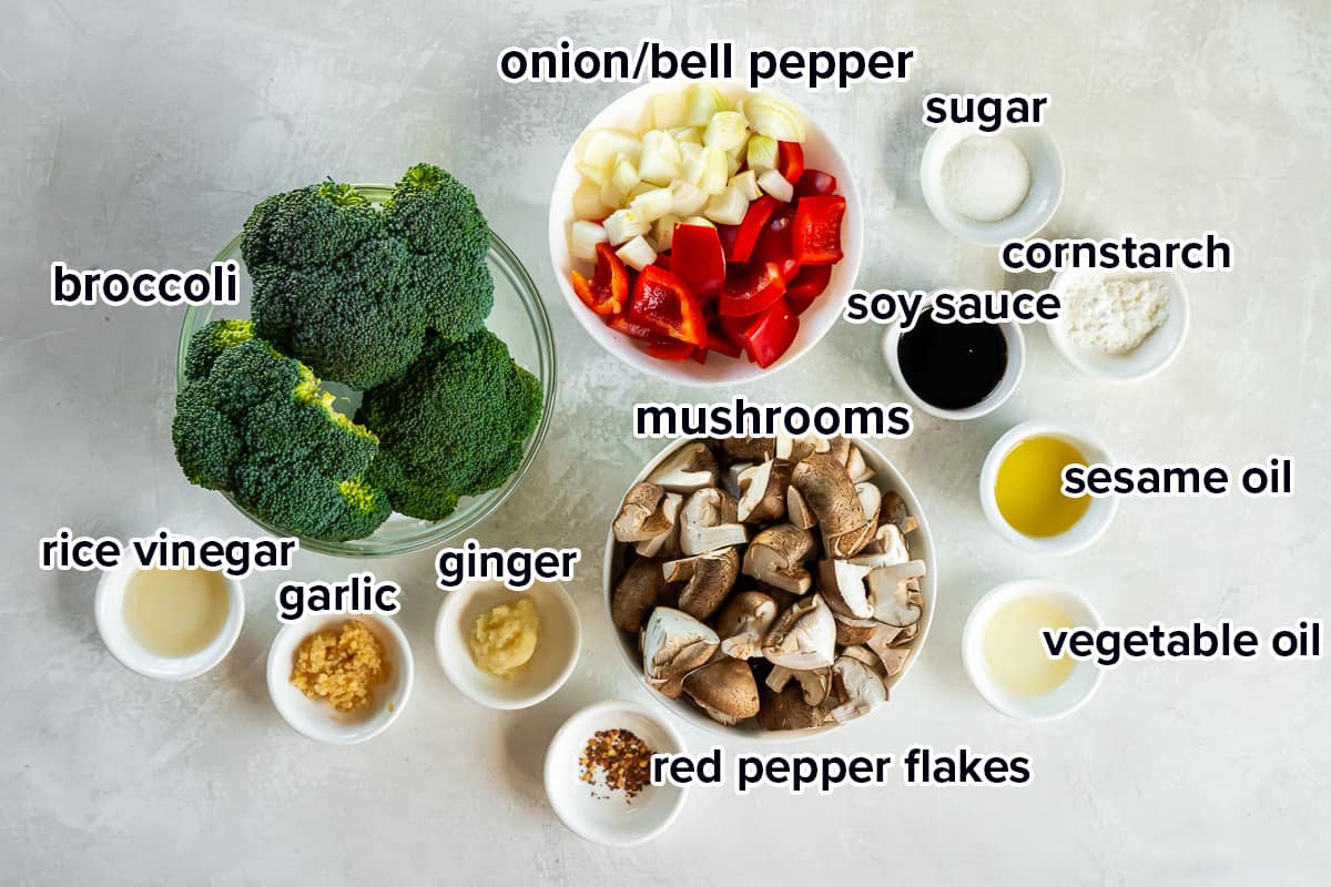 Broccoli, mushrooms, and other ingredients in bowls with text.
