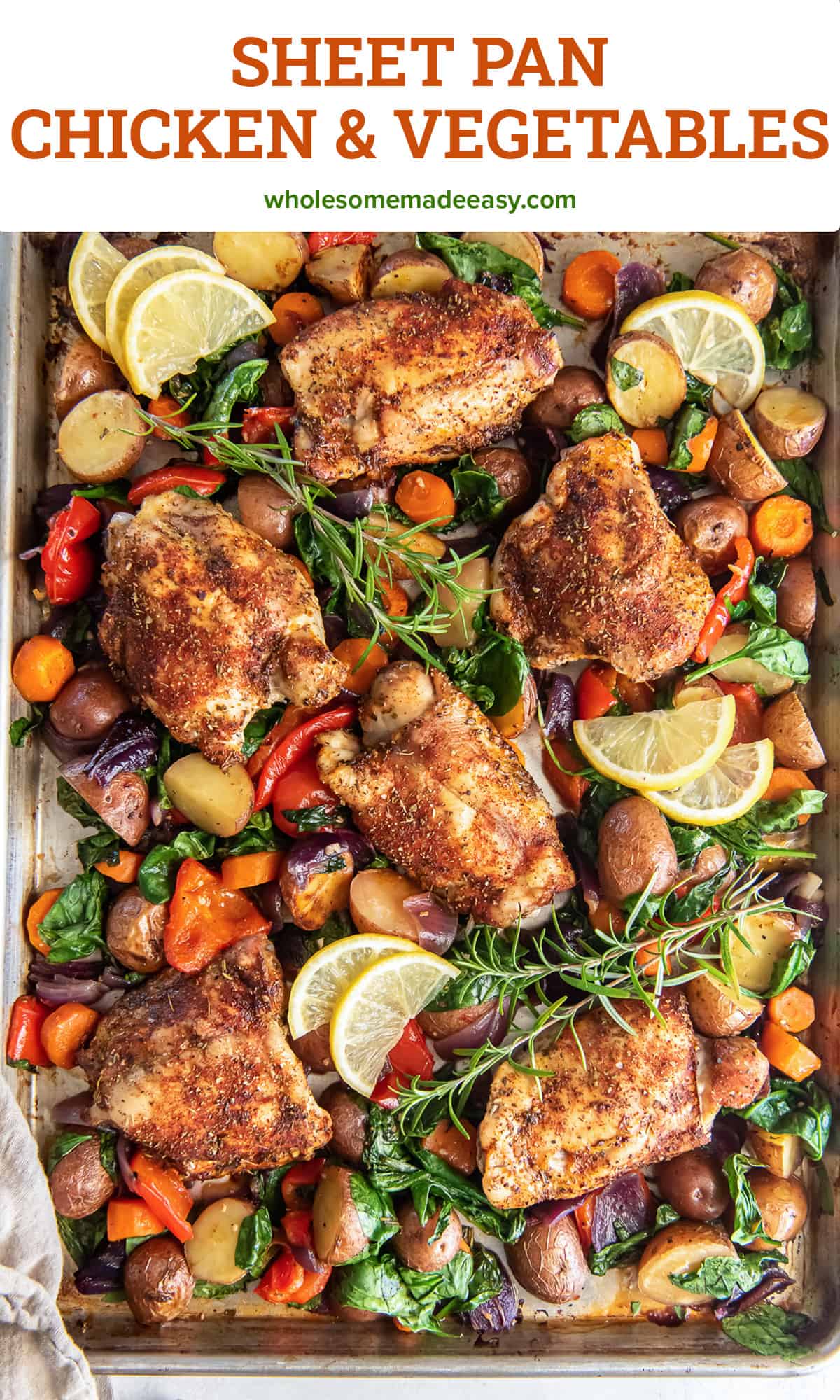 A top down shot of roasted chicken and vegetables on a sheet pan topped with lemon slices and fresh herbs with text.