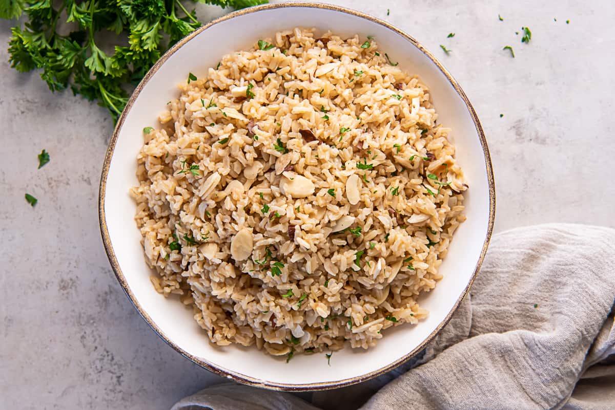 Brown rice pilaf in a serving bowl.