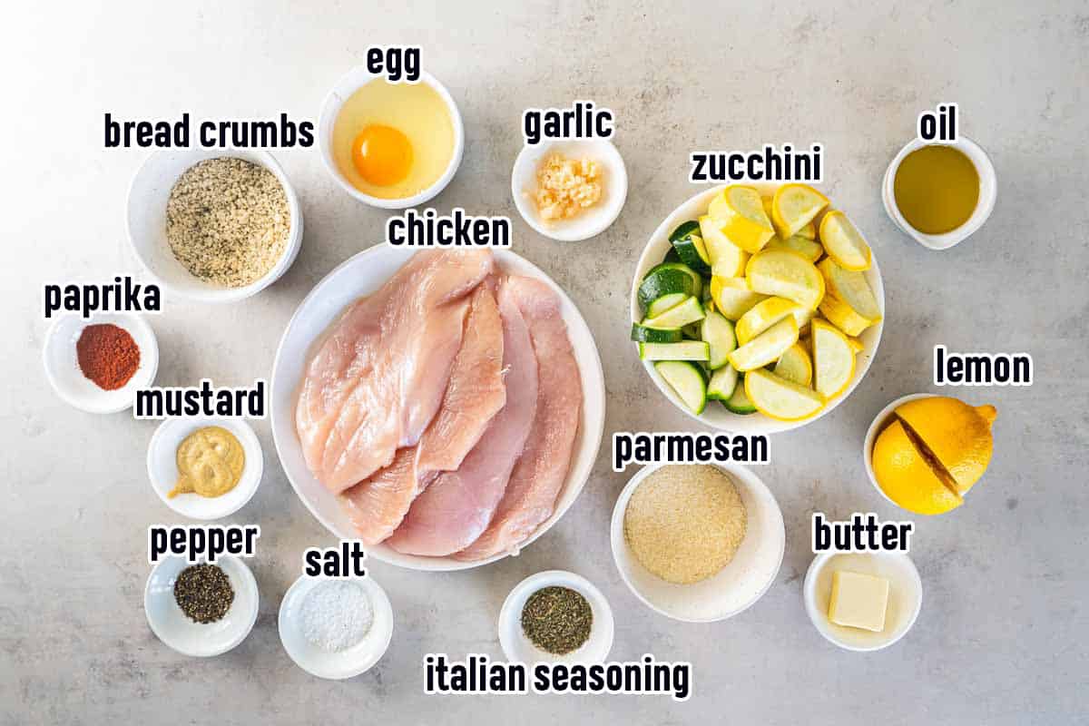 Chicken, zucchini, seasoning and other ingredients with text.