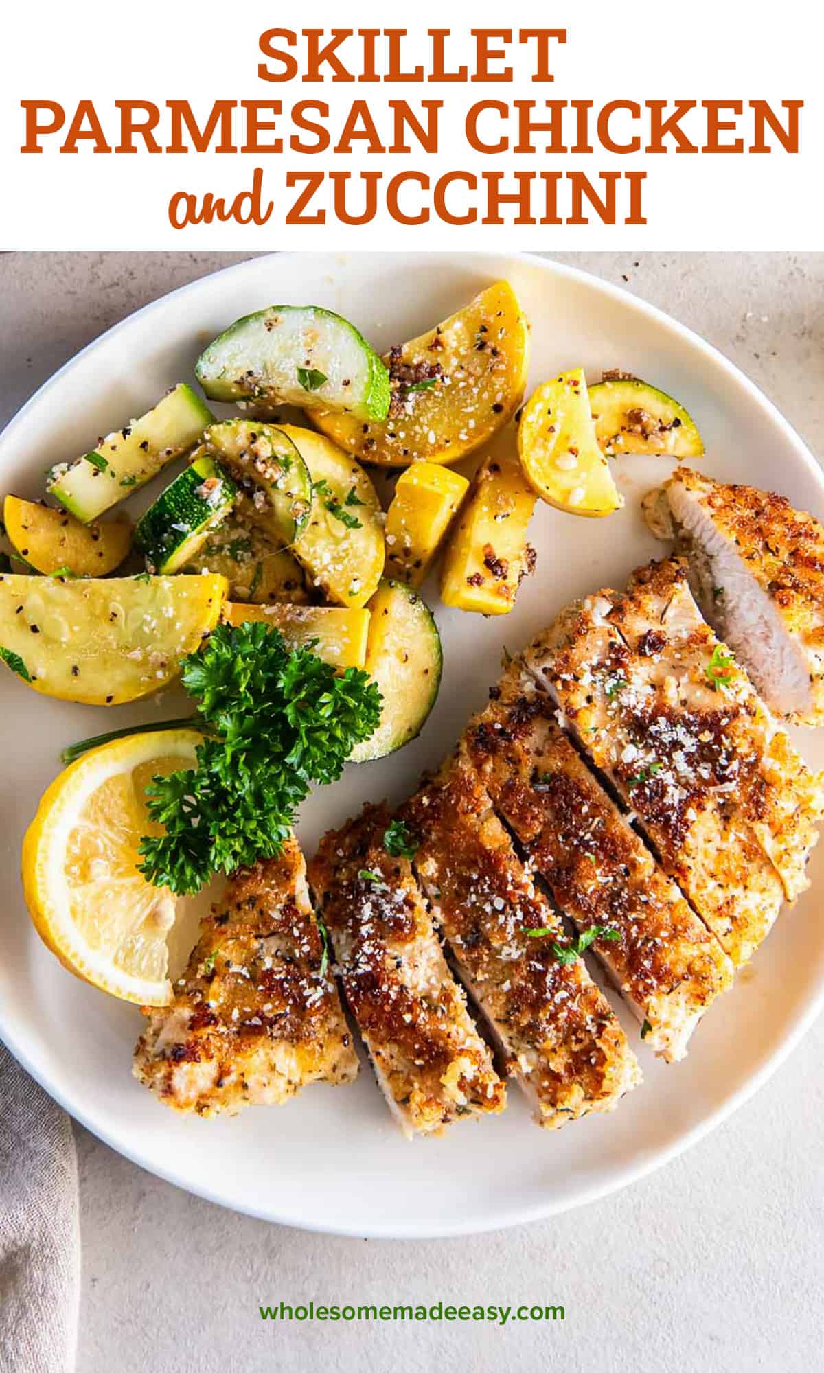 Breaded sliced chicken on a plate with green and yellow zucchini with text.