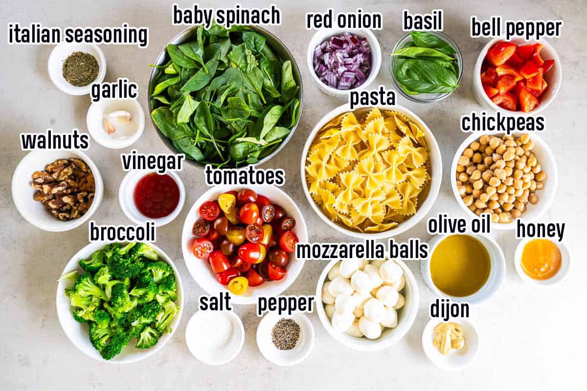 Farfalle pasta, spinach, broccoli and other ingredients in bowls with text overlay.