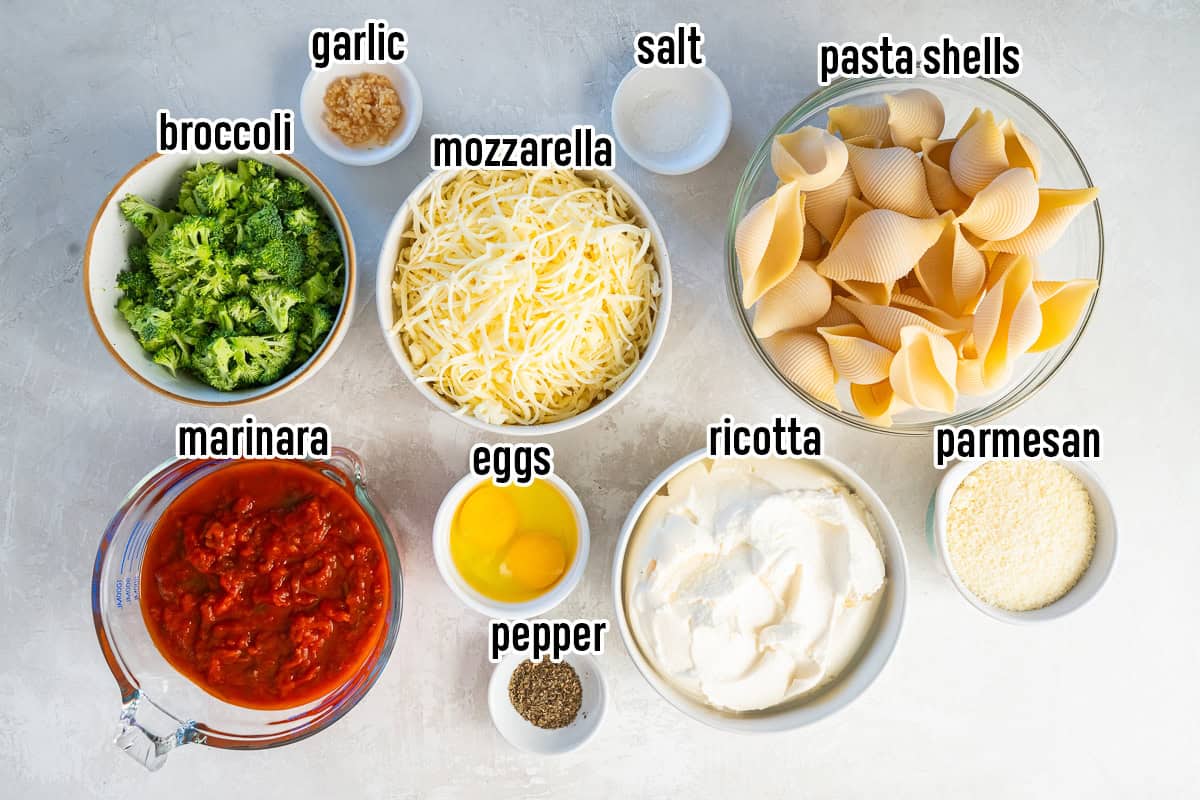 All the ingredients to make Broccoli Cheese Stuffed Shells with text overlay.