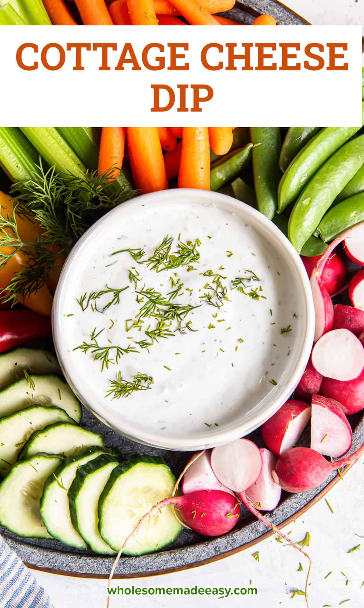A platter of vegetables with a small bowl of cottage cheese dip garnished with fresh dill with text overlay.