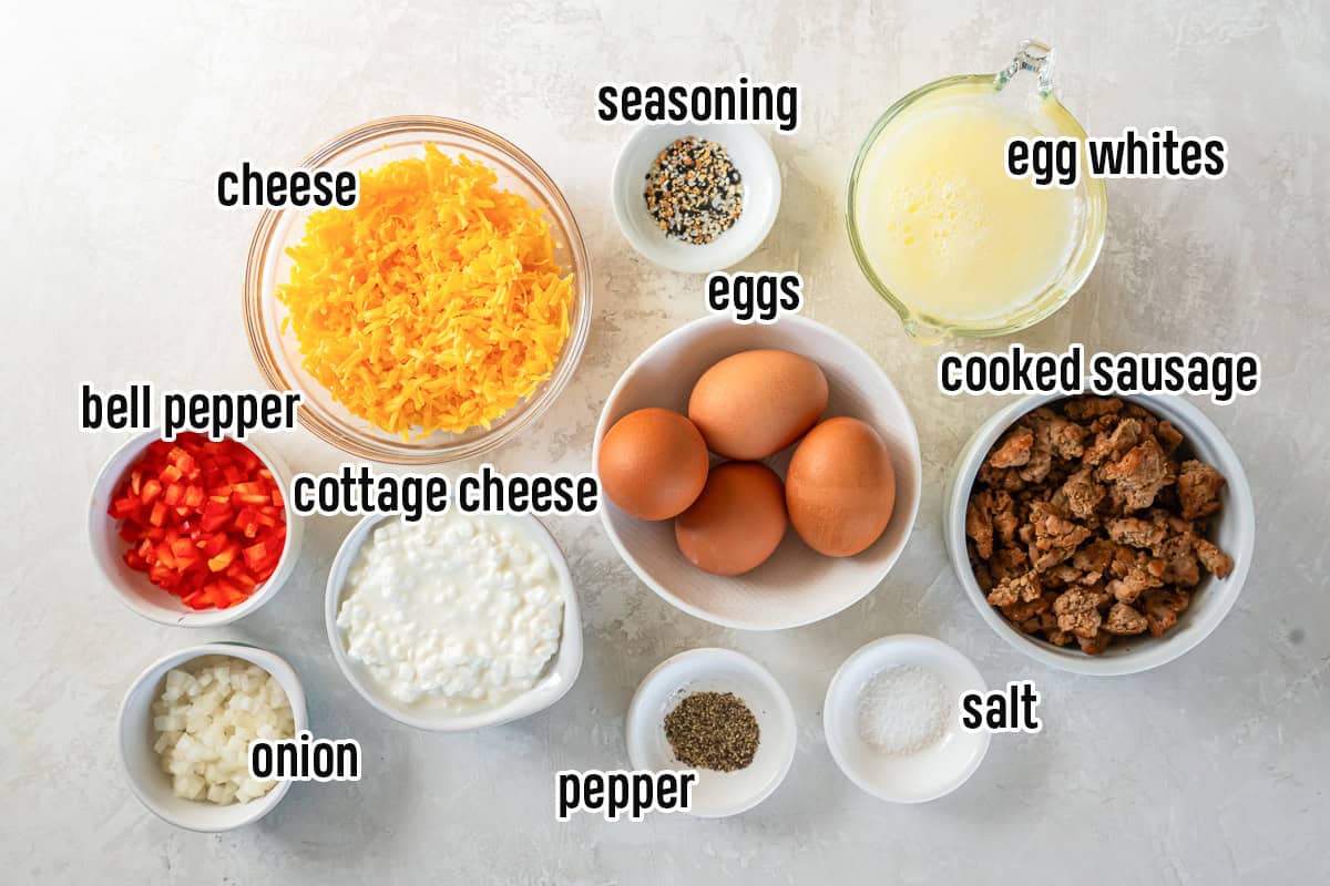 Eggs, white whites, cheese and other ingredients in bowls with text overlay.