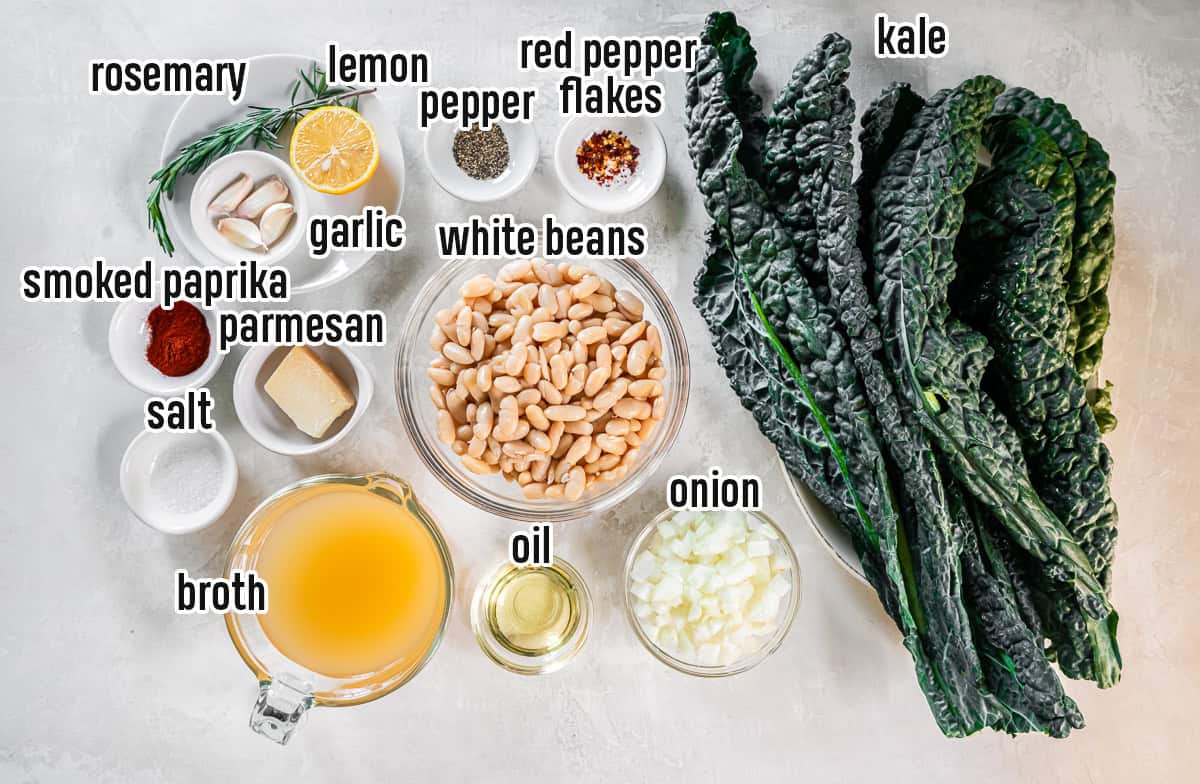 White beans, kale, garlic, Parmesan and other ingredients in bowls with text overlay.